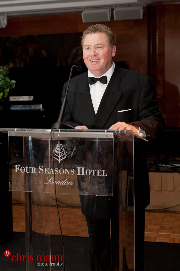 Institute of Hospitalilty Chairman's Ball 2011 and Aspiring Managers' Awards - host in dinner jacket at podium