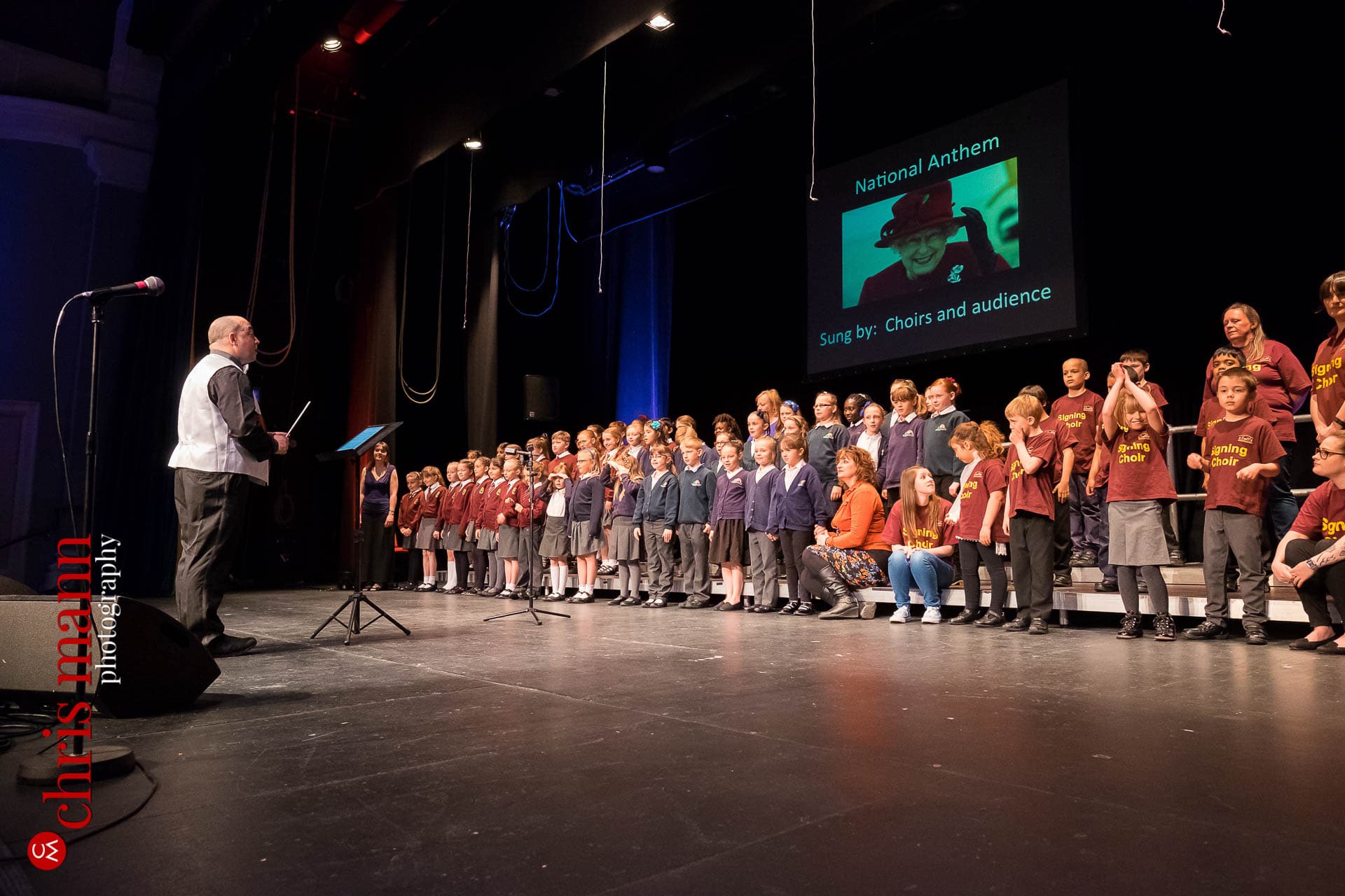 schools choirs rehearse for Choiroke 2016 concert Dorking Halls