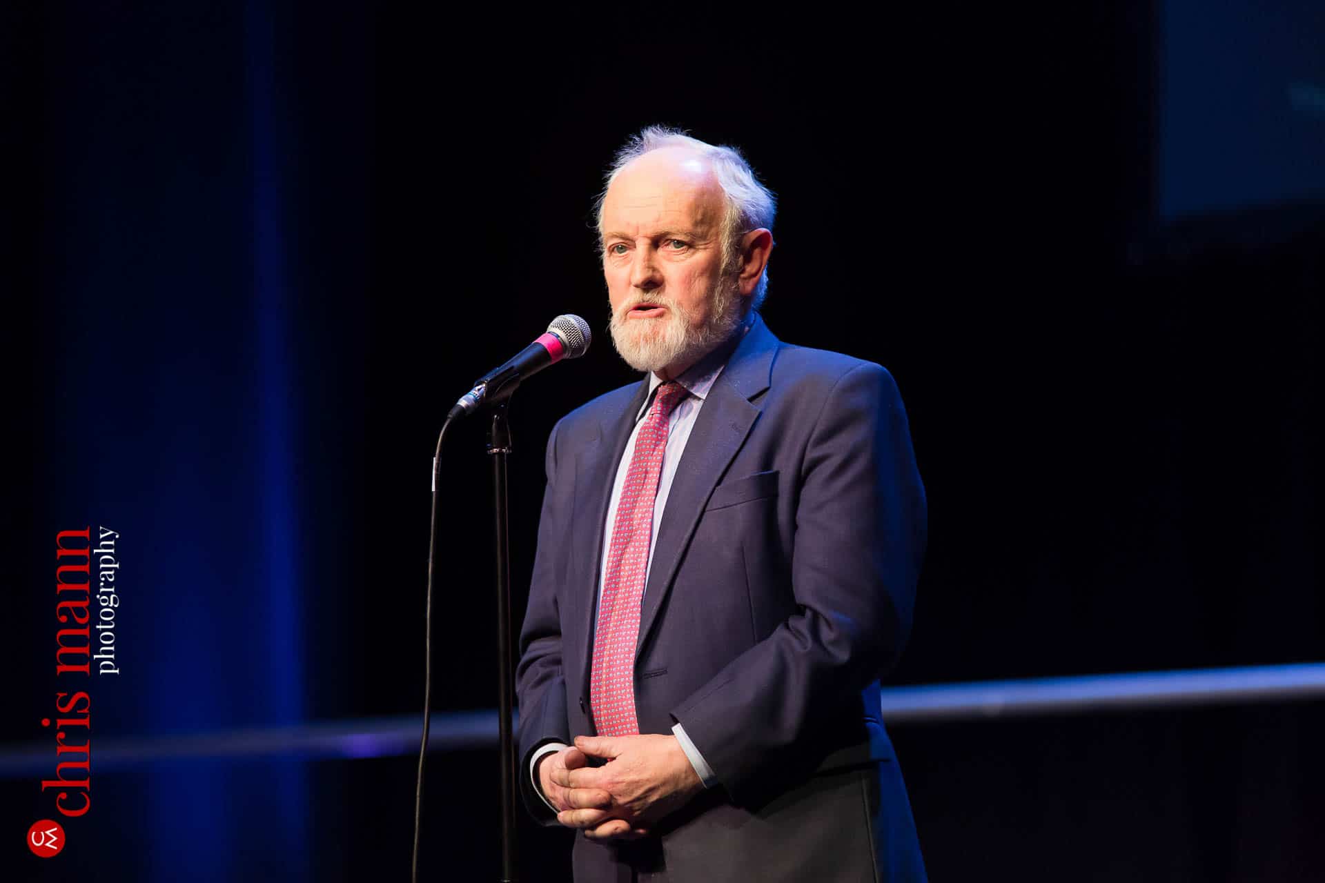 Sir Richard Stilgoe speaks at Choiroke 2016 concert Dorking Halls