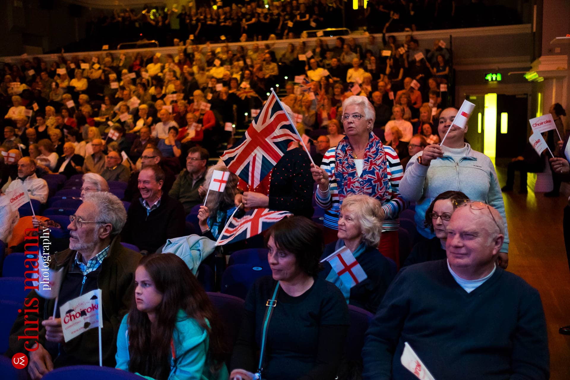 Patriotic audience wave flags St George's Day Choiroke 2016 concert Dorking Halls