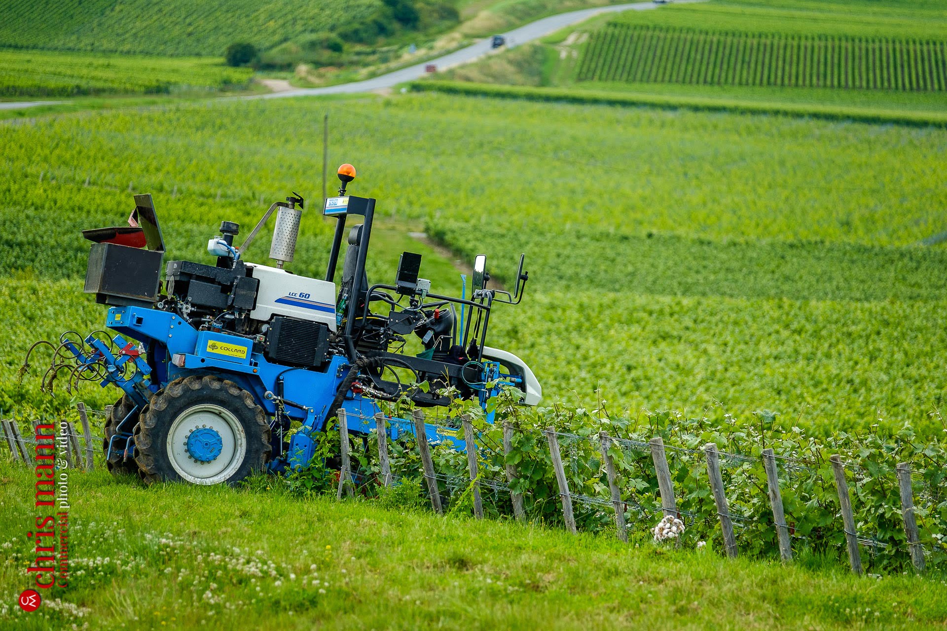 tractor in Champagne vineyards near Reims Picardy France
