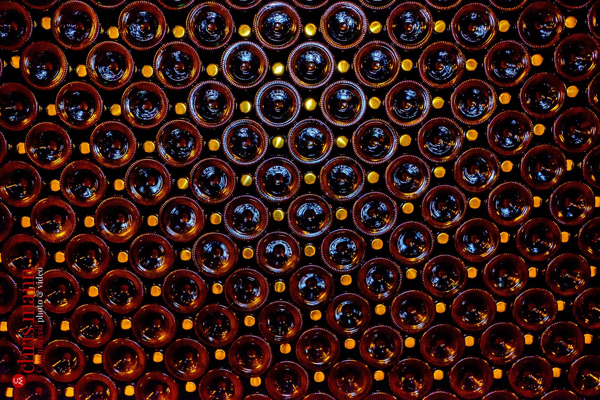 Taittinger champagne bottles maturing in cellar Reims France