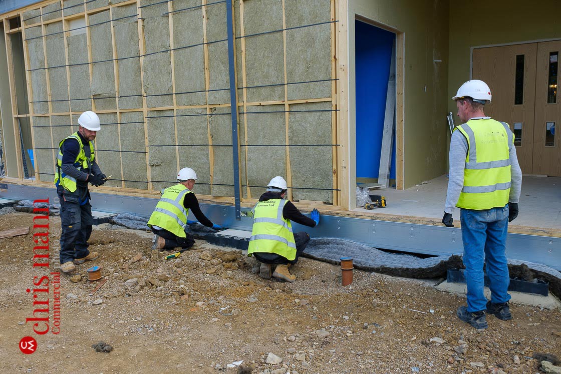 Royal Surrey Hospital ward construction June-July 2020 workers lay insulation