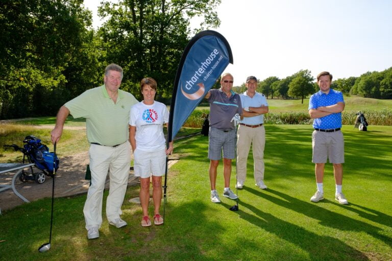 charity golf team corporate event topic of cancer charity