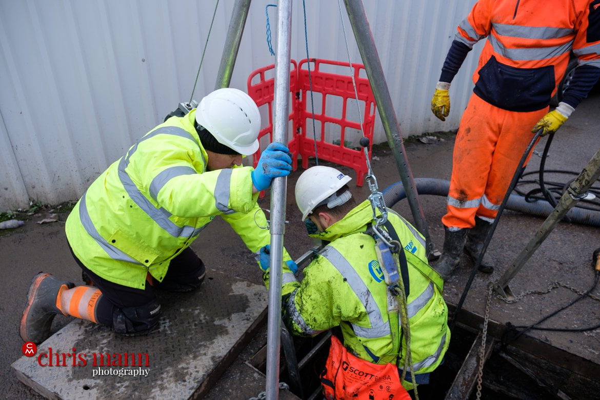 A Willow Pumps engineer emerges from the access shaft after completing his task